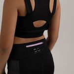 Leggings-para-niña-con-cortes-y-bolsillo-