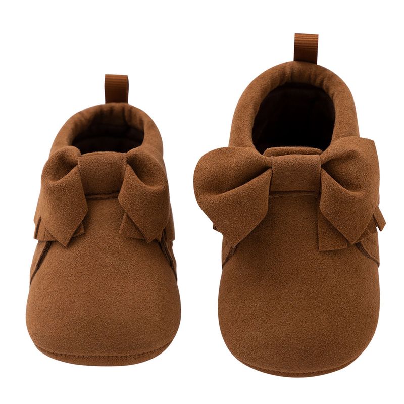 Zapatos-para-recien-nacida-con-mono